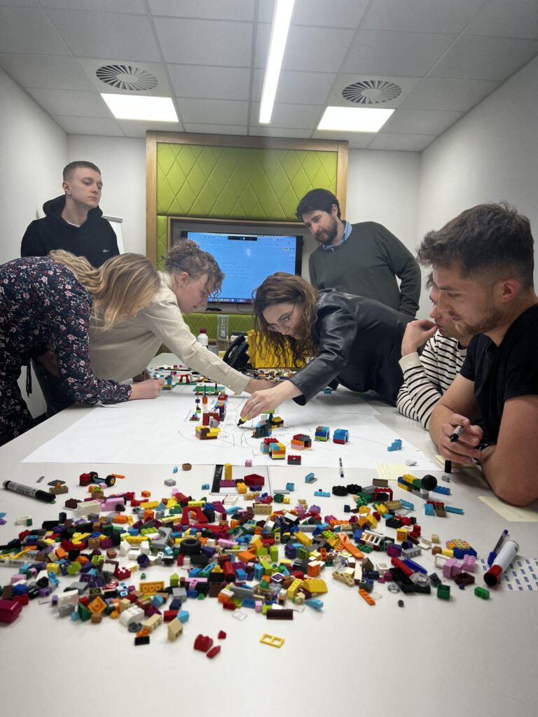 Krakow team working brainstorming with Lego Blocks